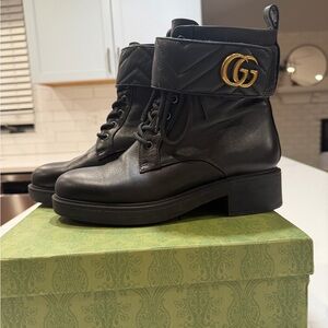 Gucci Black Leather Lace-Up Boots with Gold Emblem